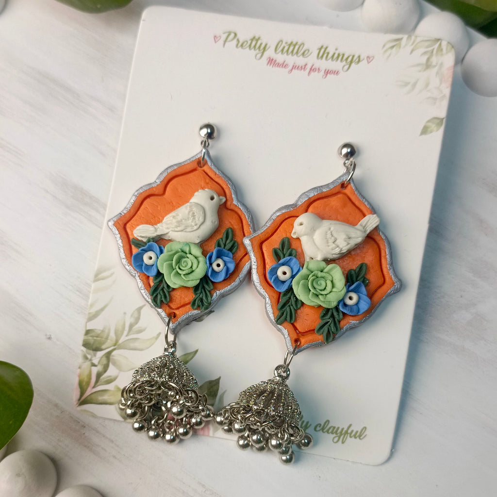 Clayful Ivory Bird Jhumkas