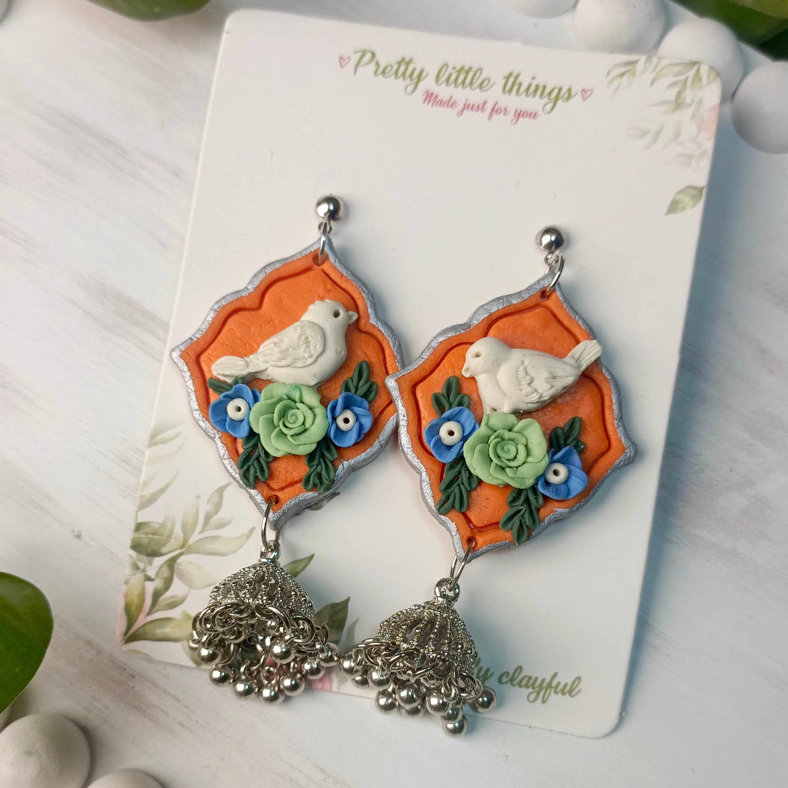 Clayful Ivory Bird Jhumkas