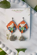 Clayful Ivory Bird Jhumkas