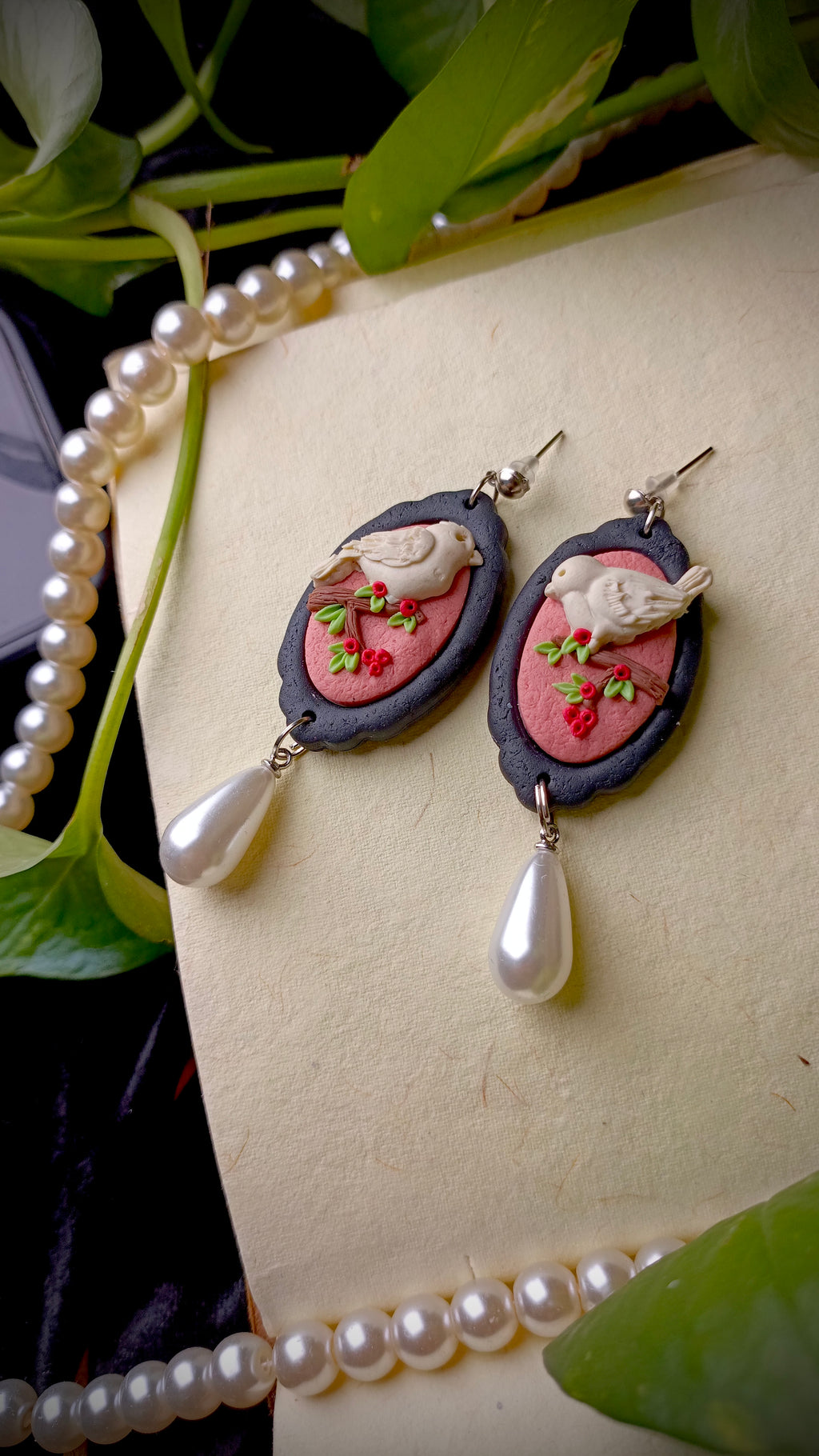Handmade pearl drop bird earrings