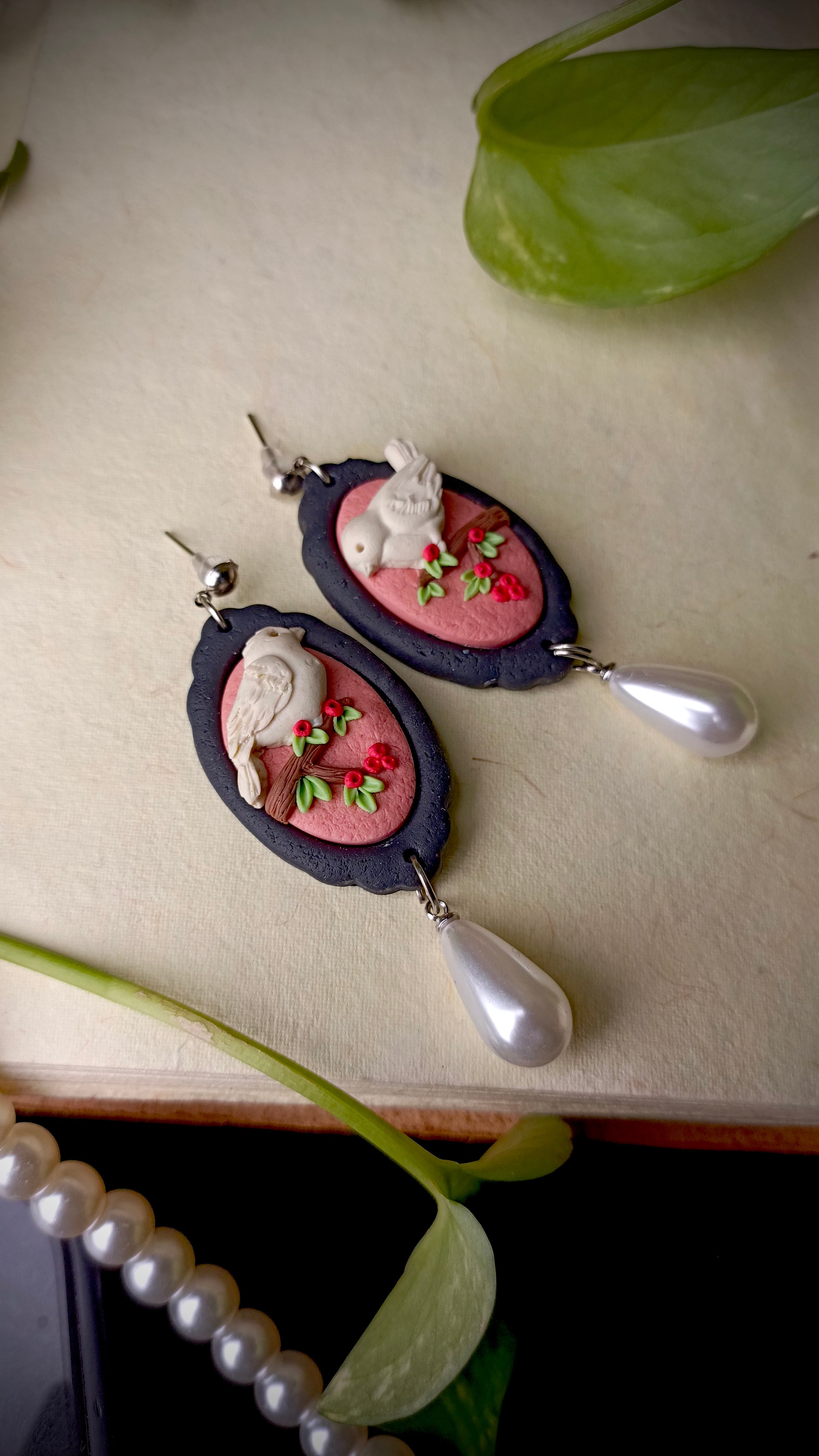 Handmade pearl drop bird earrings