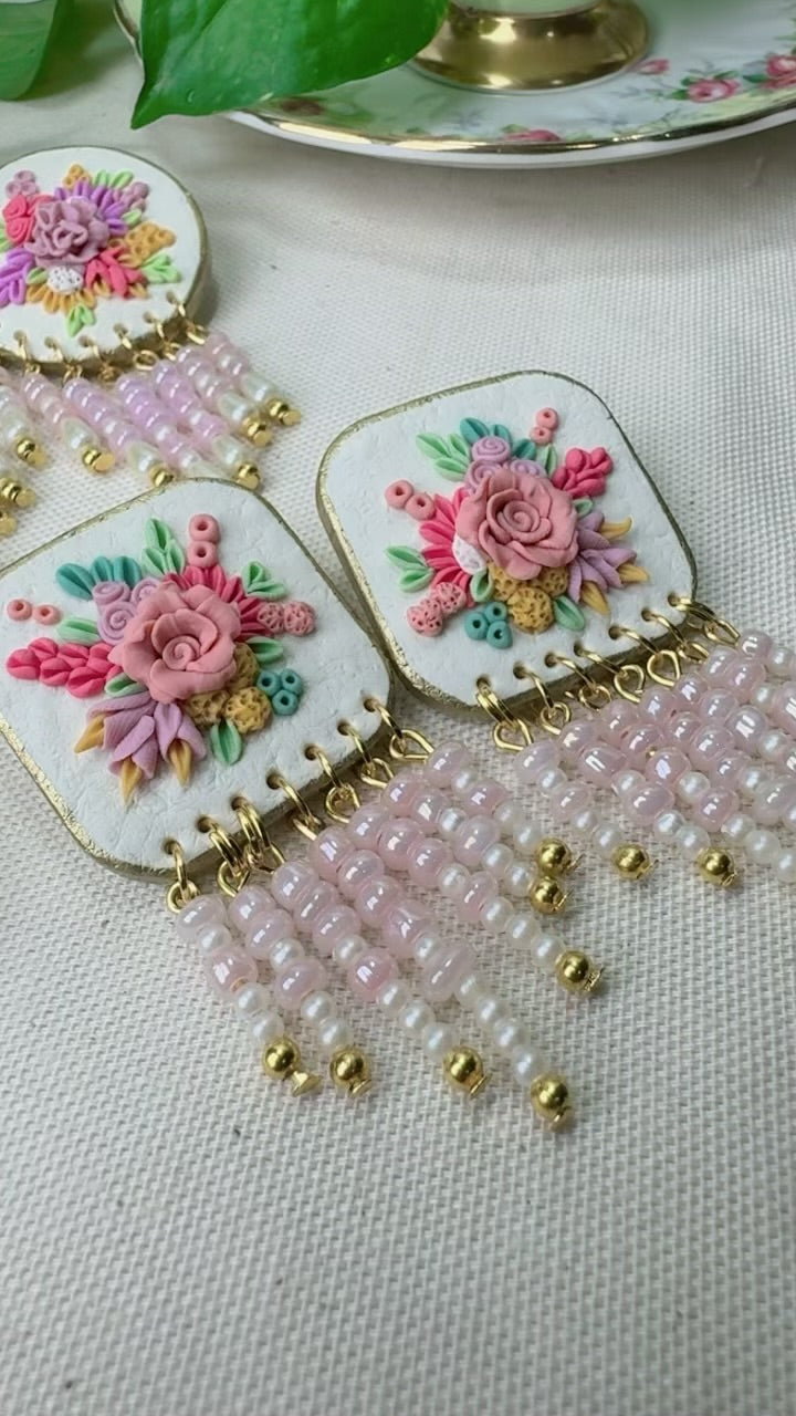 Beautiful light pink hanging beads floral earrings
