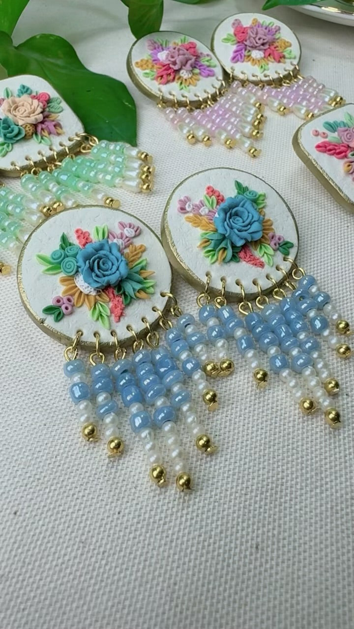 Beautiful blue hanging beads floral earrings